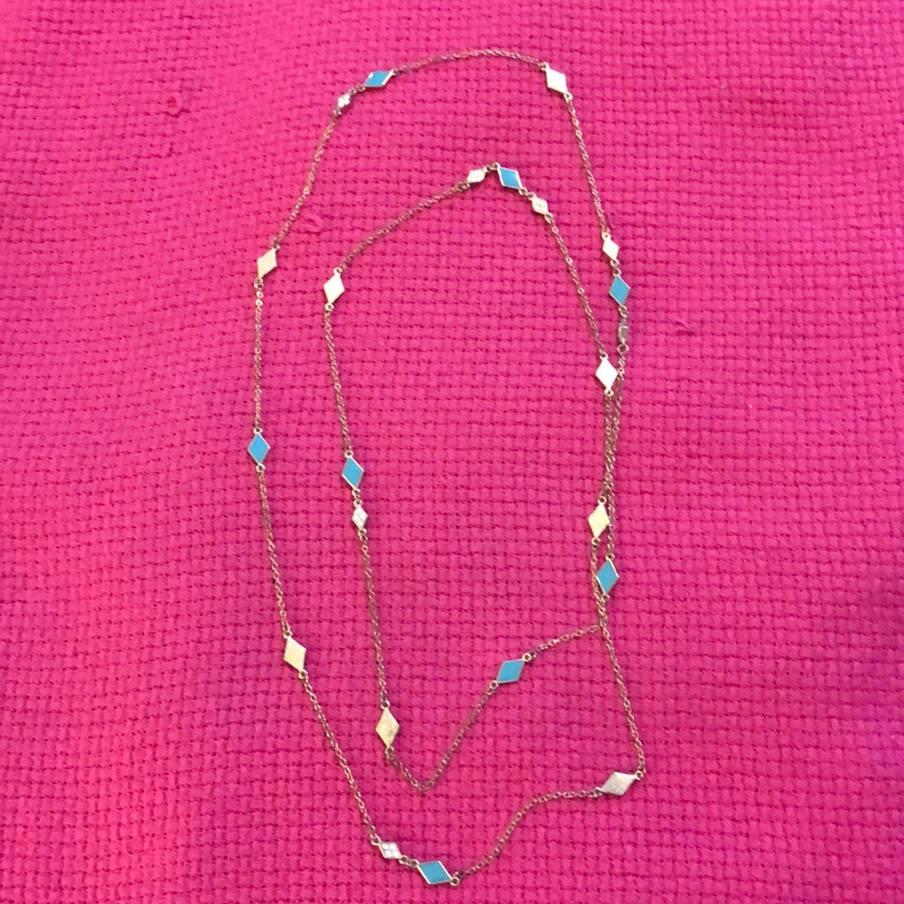 Long gold necklace with turquoise/diamonds